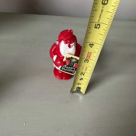 E Rosen candy co vintage plastic Santa Claus holding book